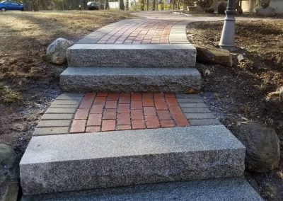 new granite steps with brick
