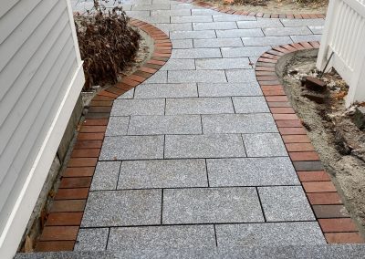 granite w_brick walkway