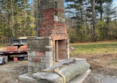 reclaimed granite hearth installed
