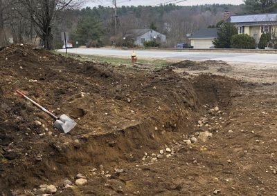 digging foundation for fieldstone wall