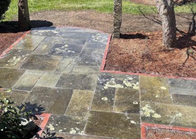 Reclaimed Bluestone Walkway with Reclaimed Granite Posts and Brick Edging